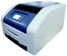 Плівковий термографічний принтер IMAX 250 для друку медичних зображень. Принтер білого кольору, з синьою вставкою зверху, має вихідний лоток для плівок. Завдяки компактним розмірам його можна встановити на робочому столі