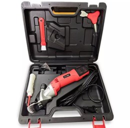 Машинка для стрижки овець, пластиковий кейс, мастило, щітка, викрутка. Повна комплектація товару, що показує зручність зберігання і транспортування