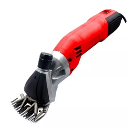 Машинка для стрижки овець помаранчевого та чорного кольорів, вид збоку. Пристрій для професійної стрижки тварин