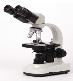 Бінокулярний мікроскоп МС-20 Фіалка. Прилад білого кольору з чорними елементами, оснащений бінокулярною насадкою, револьвером з обєктивами та механічним предметним столиком. Призначений для ветеринарної діагностики та лабораторних досліджень